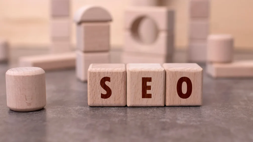 SEO strategy for doctors built from the ground up with wooden blocks, emphasizing a solid foundation for online success
