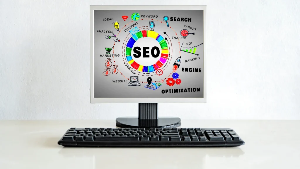 Computer displaying colorful SEO optimization elements, symbolizing solutions provided by professional SEO Companies in Reading.